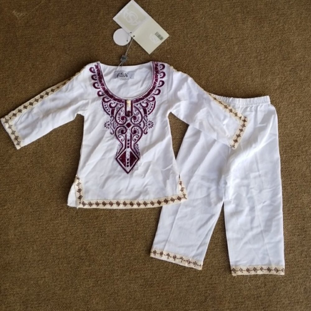 Embroidered outfit for a little baby girl